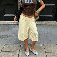 Hollow Swirl Embroidery Drawstring Wide Leg Capri Pants