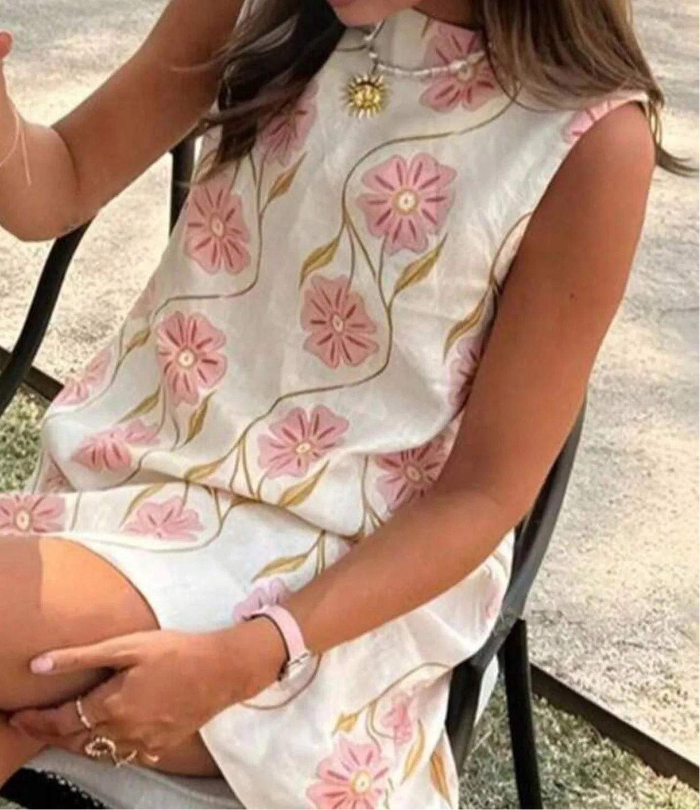 Woman in a floral dress- close-up