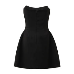 Black strapless dress on a white background