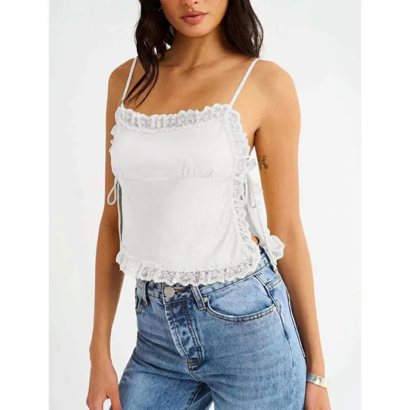 Model displaying a short lace trim satin cami top with an open back.