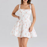 Women's white floral print back tie flare mini dress with turn-down collar and full sleeves.