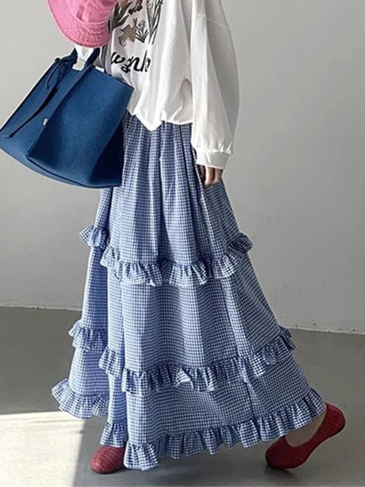 Women's blue ruffles plaid long skirt with A-line silhouette.