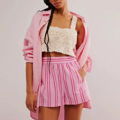 Women's multi-color elastic mid-waist shorts.