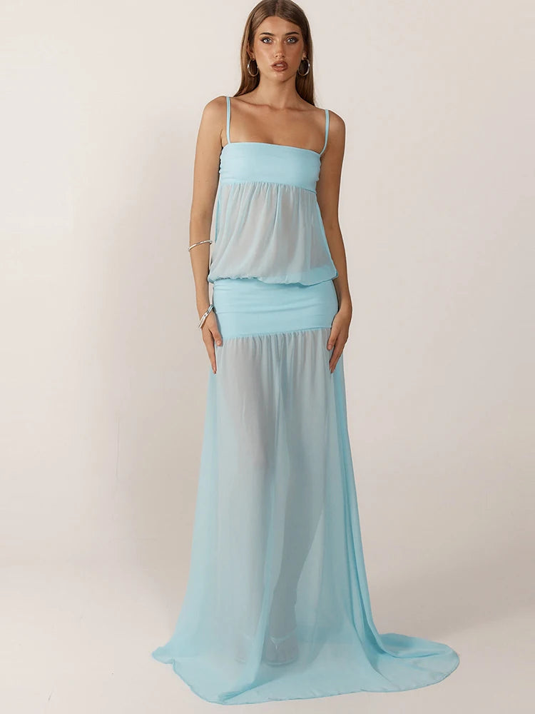 Woman wearing a light blue two-piece dress