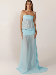 Woman wearing a light blue two-piece dress