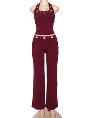 Maroon outfit with gold buttons on a white background