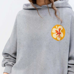 Gray hoodie with a floral patch on the chest-close-up