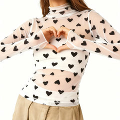 Sheer top with black heart patterns