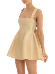 Beige dress with cut-out design