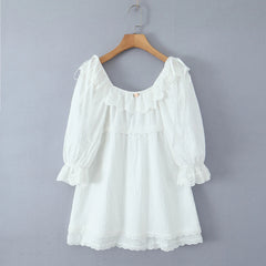 White blouse with ruffled sleeves on a wooden hanger - 3/4 puff sleeves