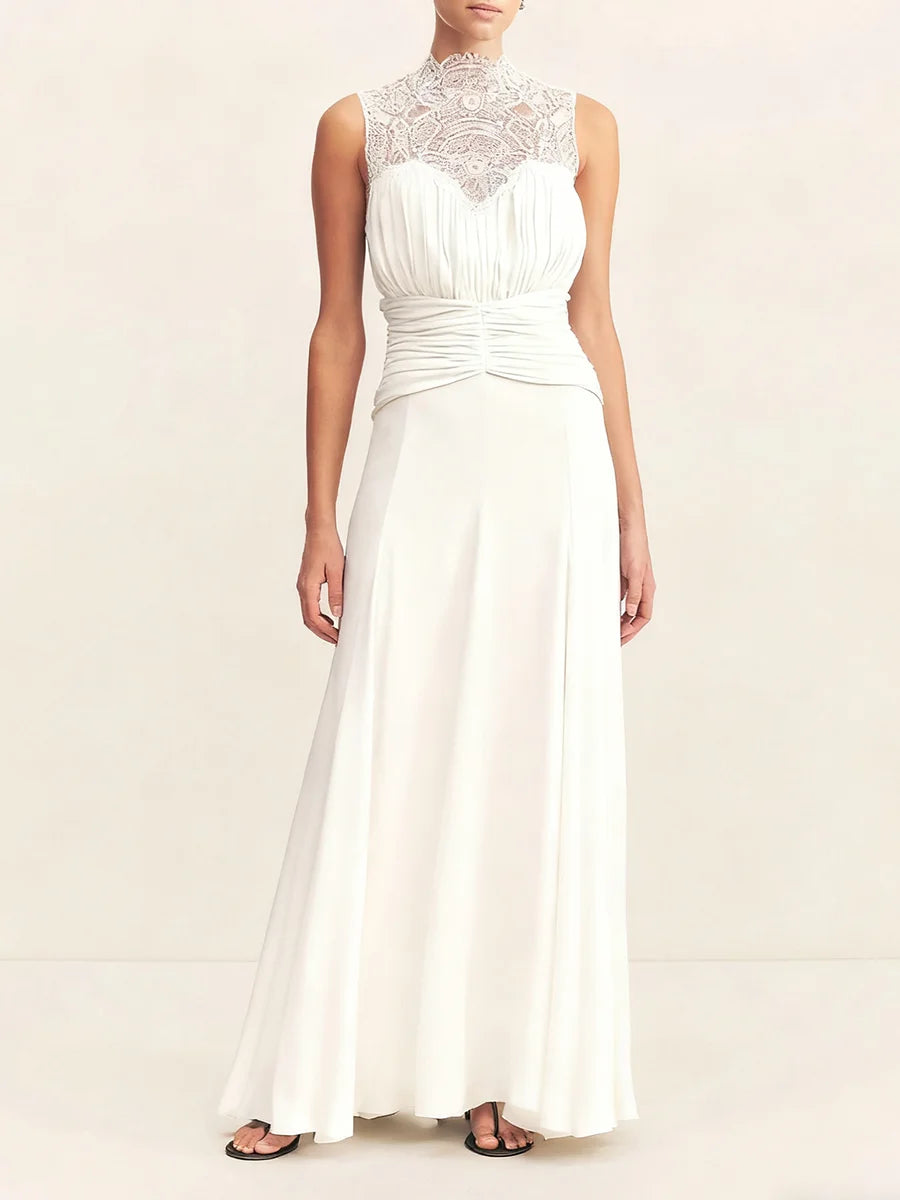 White evening gown with lace neckline on a white background