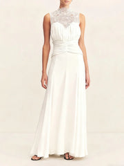 White evening gown with lace neckline on a white background