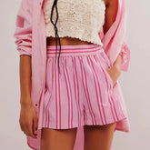 Women's multi-color elastic mid-waist shorts.