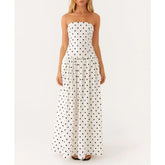 Women's strapless dot/floral print pleated tube long dress with A-line silhouette.