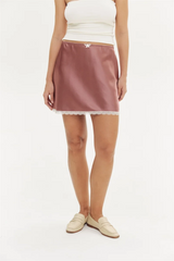 Women's satin bow lace mini skirt with a straight silhouette.
