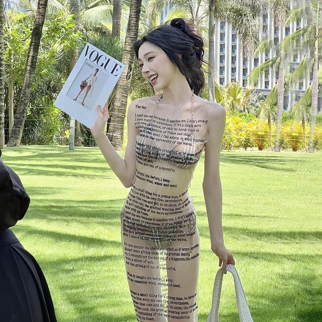 Women's letter print transparent mesh tank mini dress with A-line silhouette.