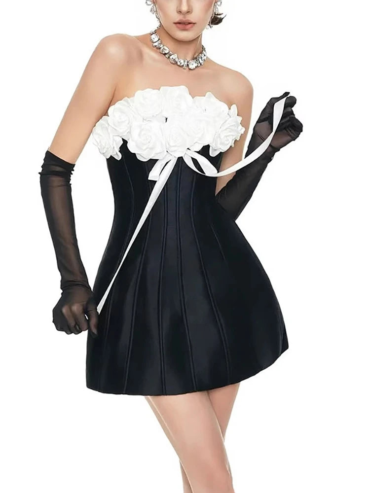 Black dress with white floral top and gloves