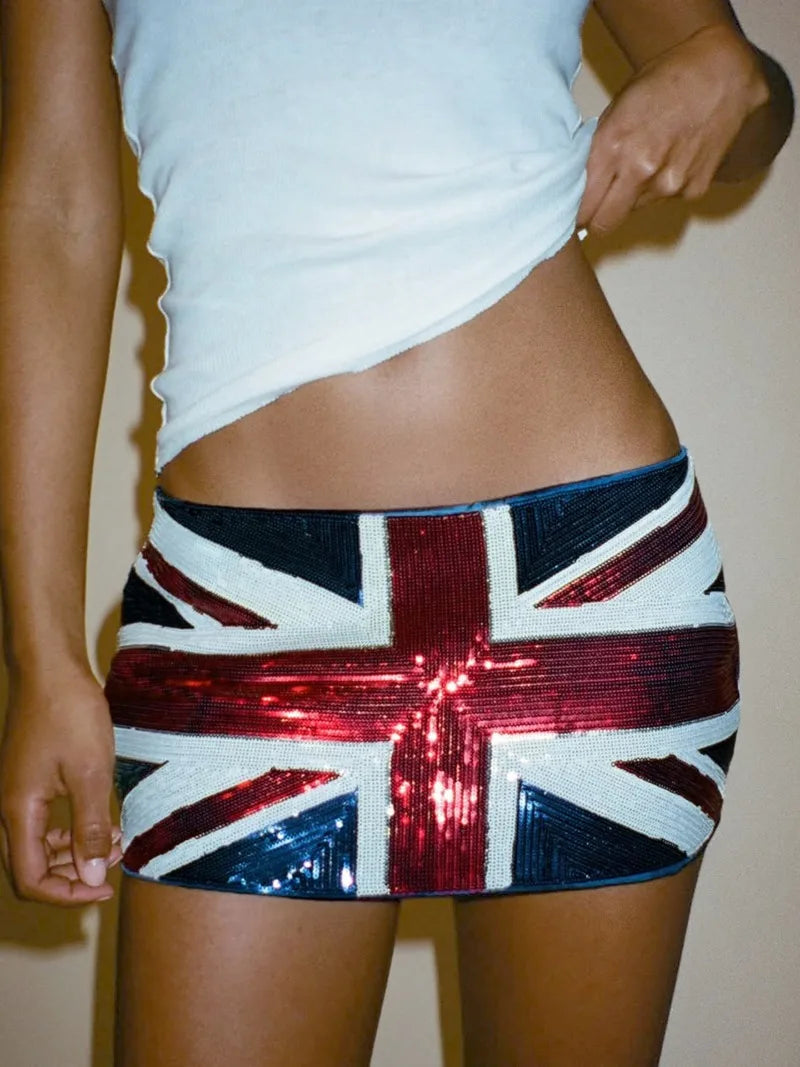 Person wearing a sequin mini skirt with the Union Jack design.