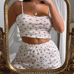Women's sleeveless two piece pajama short set for lounging.