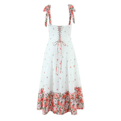 Women's white printed patchwork tie-up maxi dress with floral pattern and V-neck.