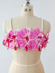 Women's pink 3D orchid pearl strap crop top.