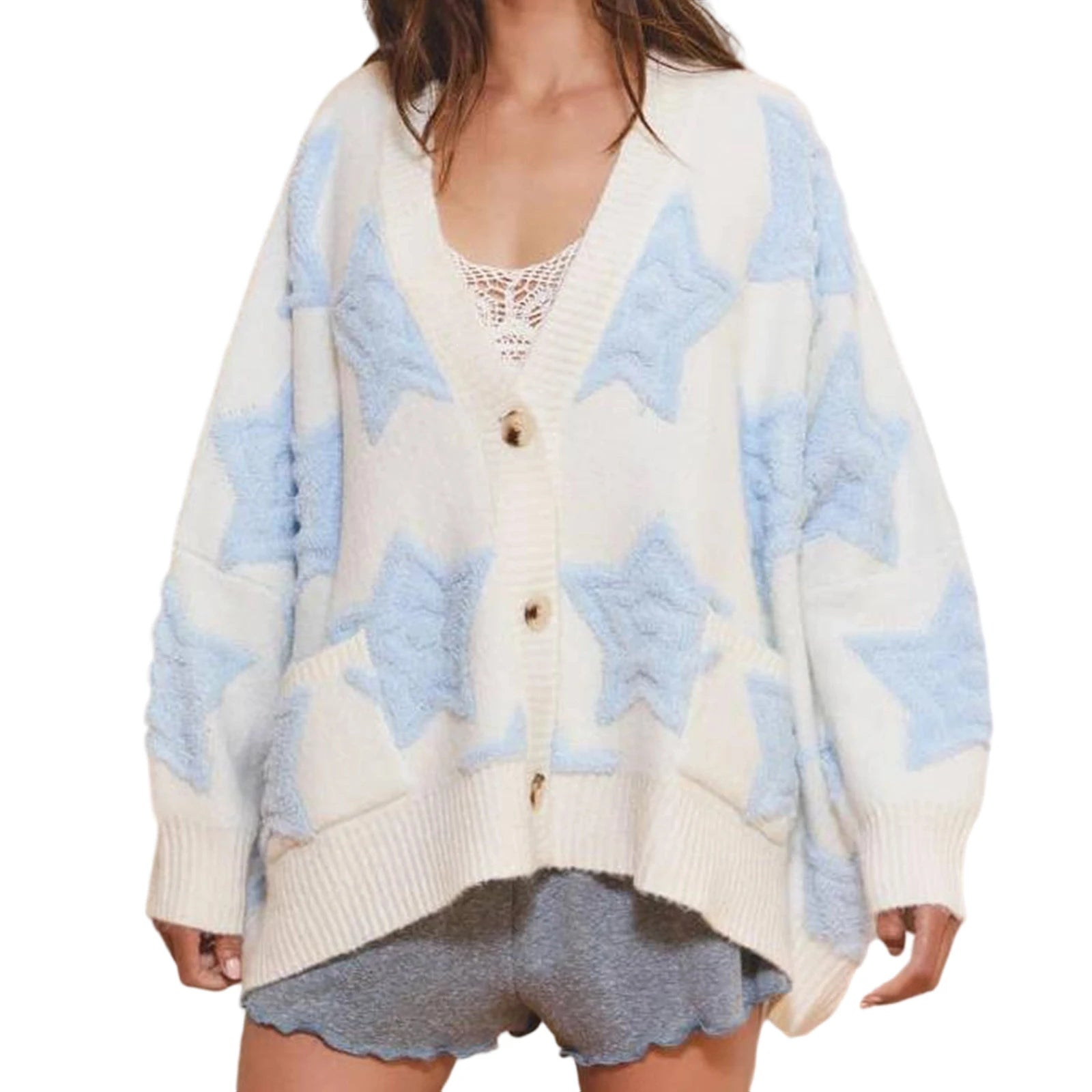 White cardigan with blue star patterns worn by a person