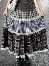 Women's patchwork lace plaid high waist long skirt with A-line silhouette.