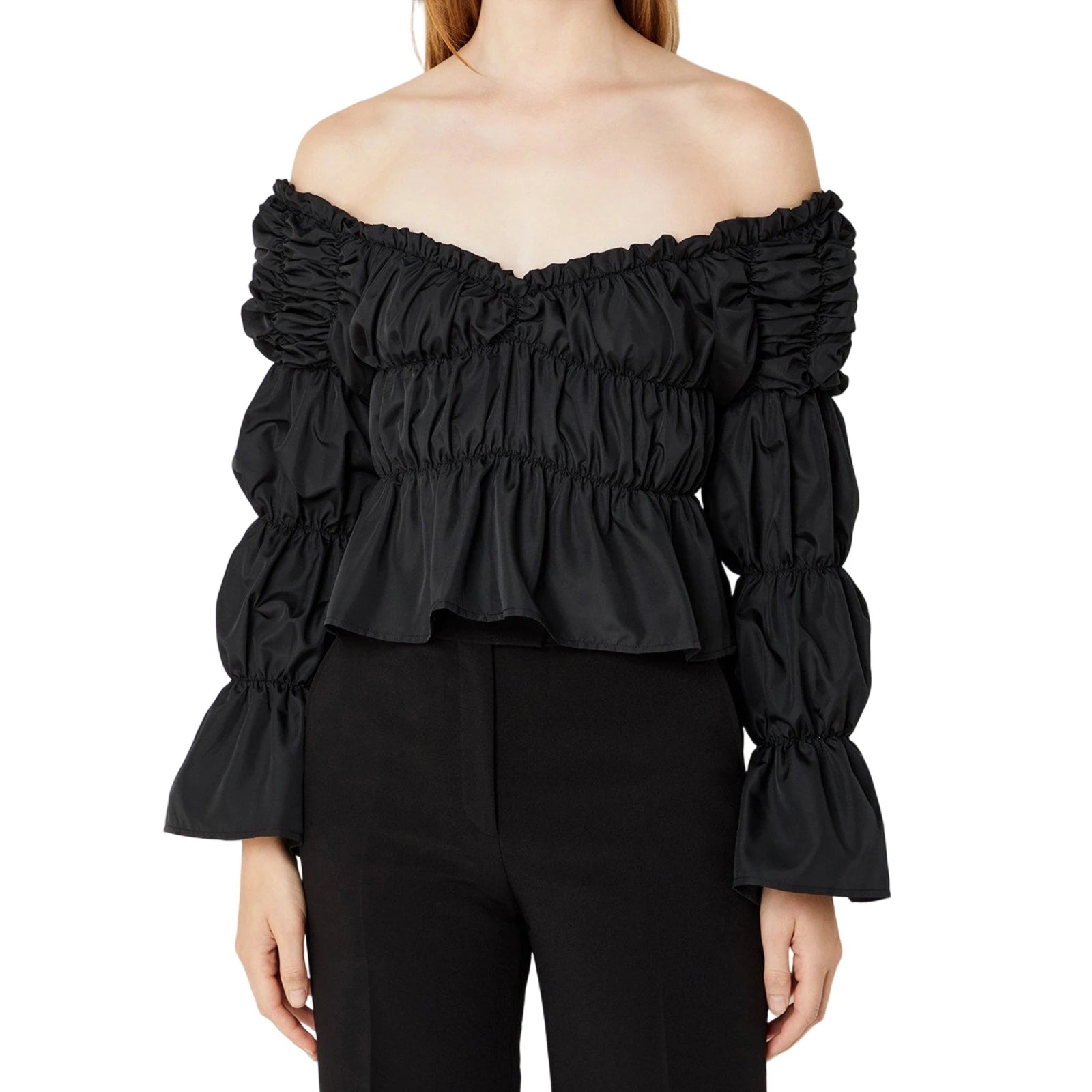 Black off-shoulder top with ruffled details on a white background