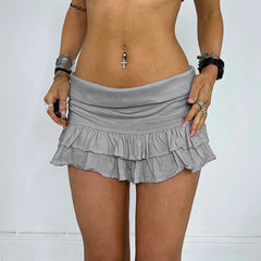 Gray ruffled skirt worn by a model