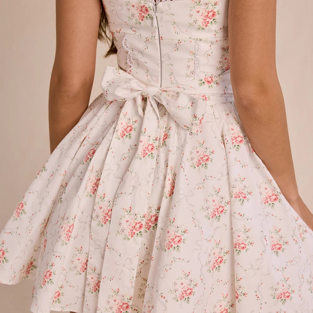 Women's white floral print back tie flare mini dress with turn-down collar and full sleeves.