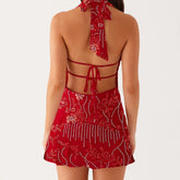 Red patterned dress with cut-out back design