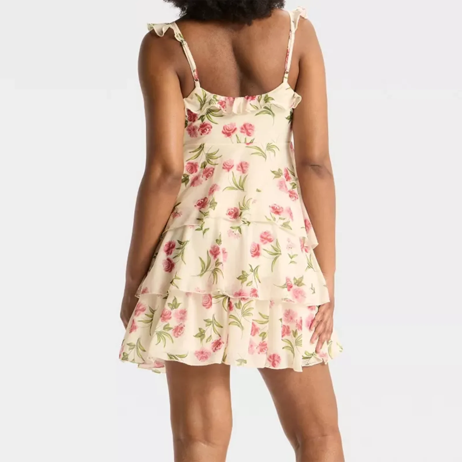 Woman wearing a floral dress- back