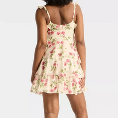 Woman wearing a floral dress- back