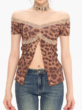 Leopard print top with lace details and blue jeans