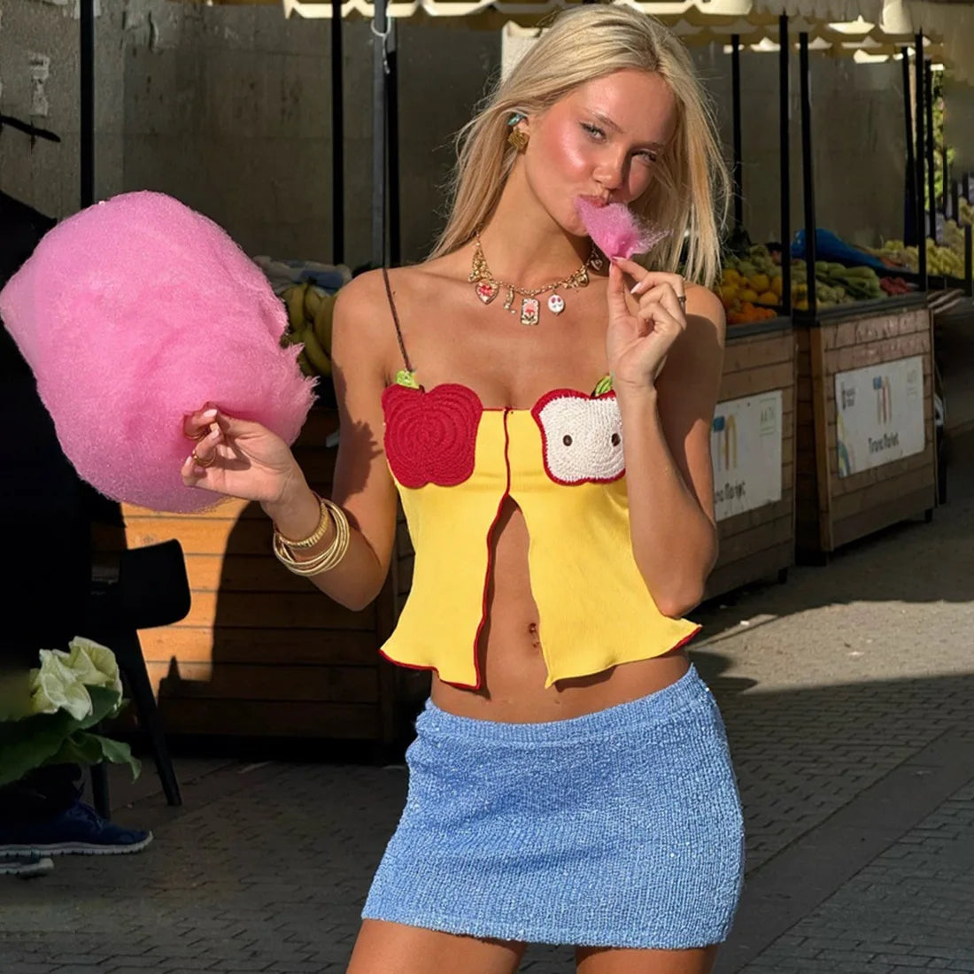 Women's fruit embroidery split crop top with backless detail.