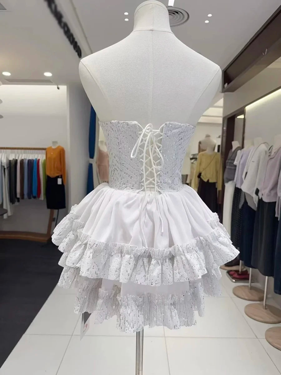 White lace dress on a mannequin in a clothing store