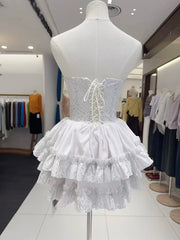 White lace dress on a mannequin in a clothing store