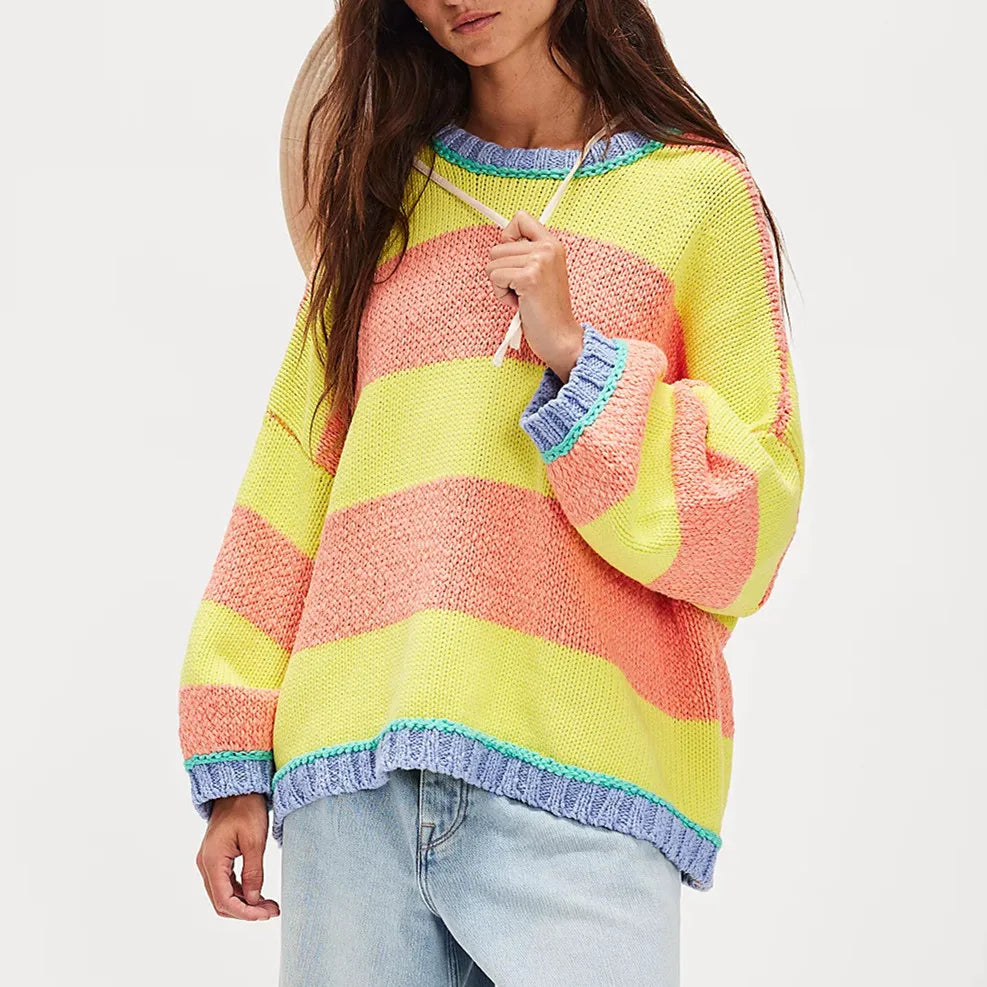 Person wearing a colorful striped sweater