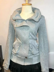 Light gray jacket on a mannequin against a white background