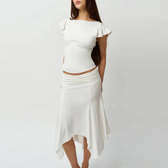 White dress with ruffled sleeves on a plain background