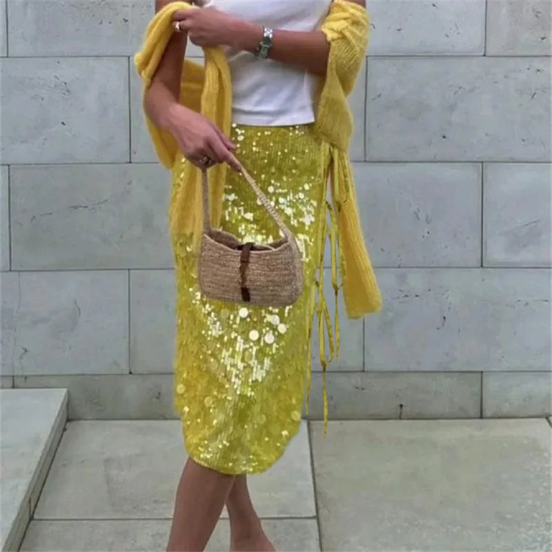 Women's radiant sequin midi skirt in pink, yellow, blue.
