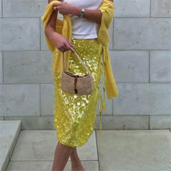 Women's radiant sequin midi skirt in pink, yellow, blue.