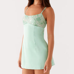 Mint green slip dress with floral lace details