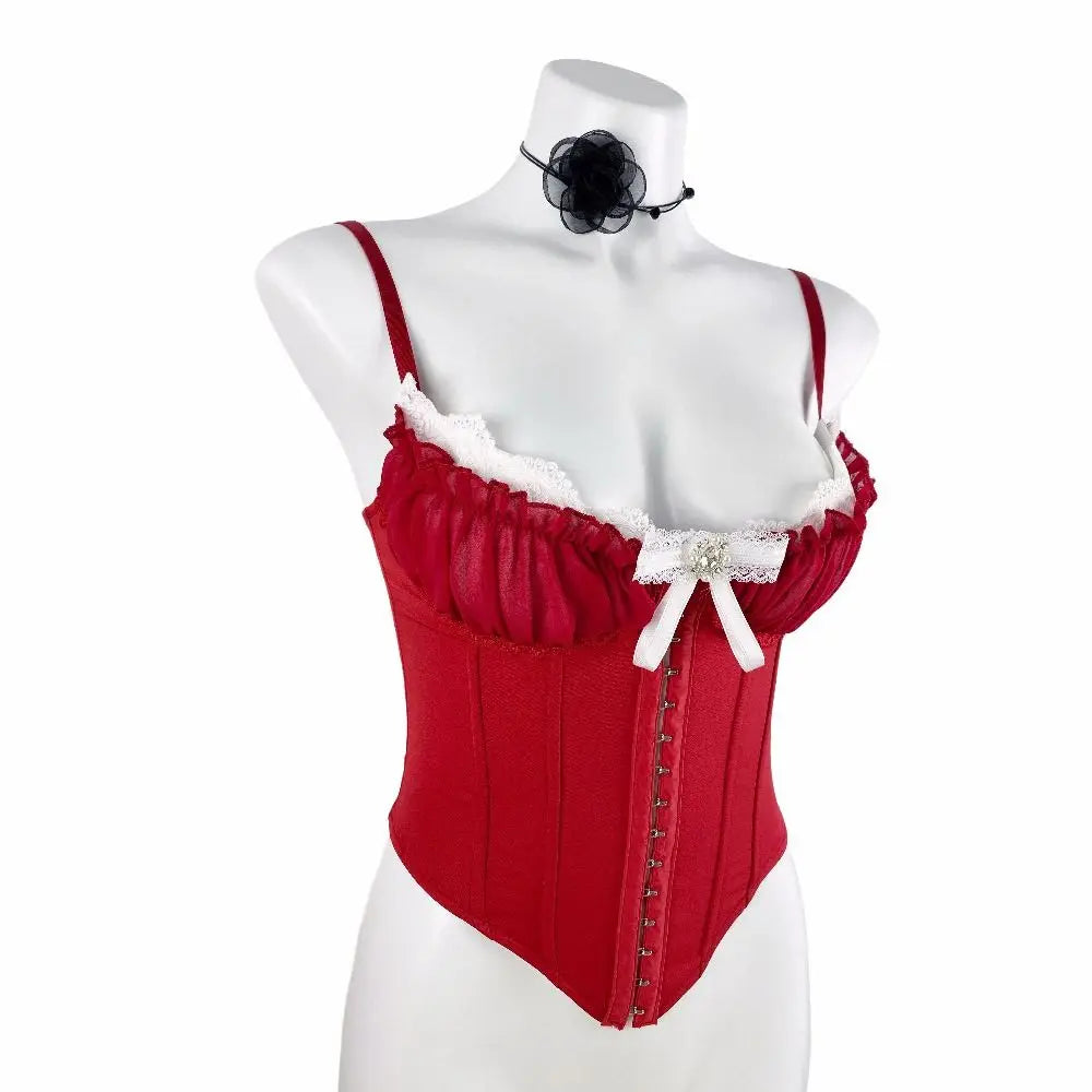 Red corset with white lace trim on a mannequin