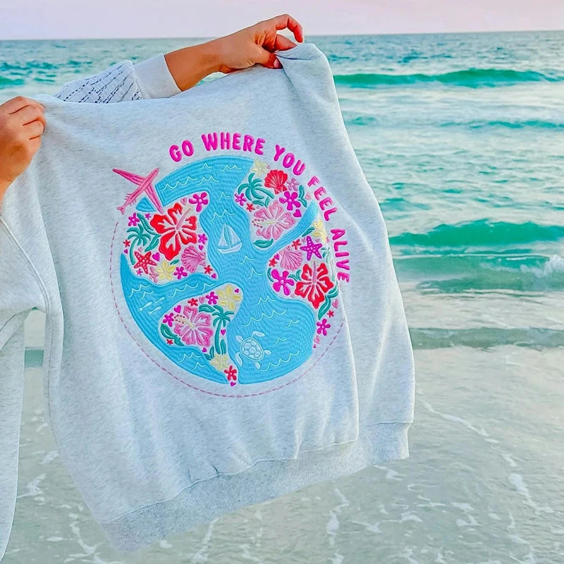 Women's grey flower letter embroidery hoodie with a loose fit and kangaroo pocket.