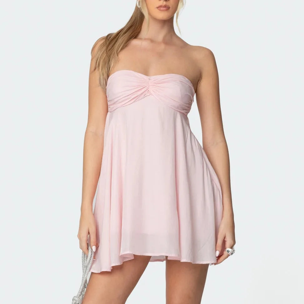 Women's pink bandeau scarf mini dress with floral print and A-line silhouette.