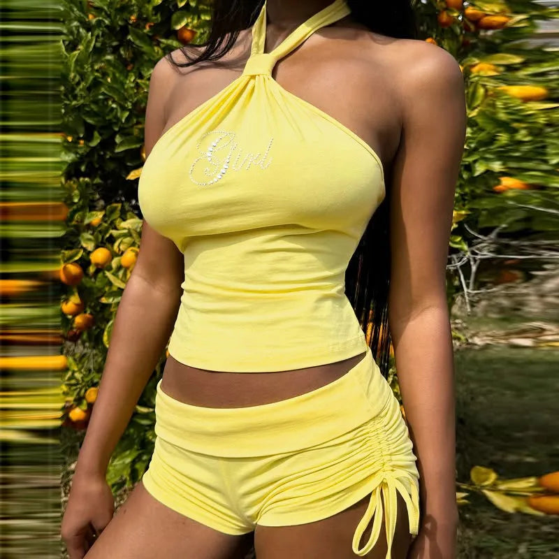 Women's halter rhinestone crop top and drawstring shorts co-ord set in yellow or black.