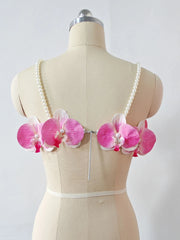 Women's pink 3D orchid pearl strap crop top.