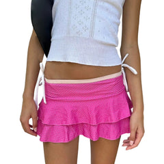 White top and pink skirt with white polka dots - front