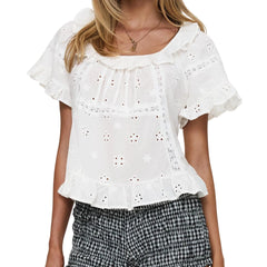 White embroidered blouse with ruffled sleeves on a white background